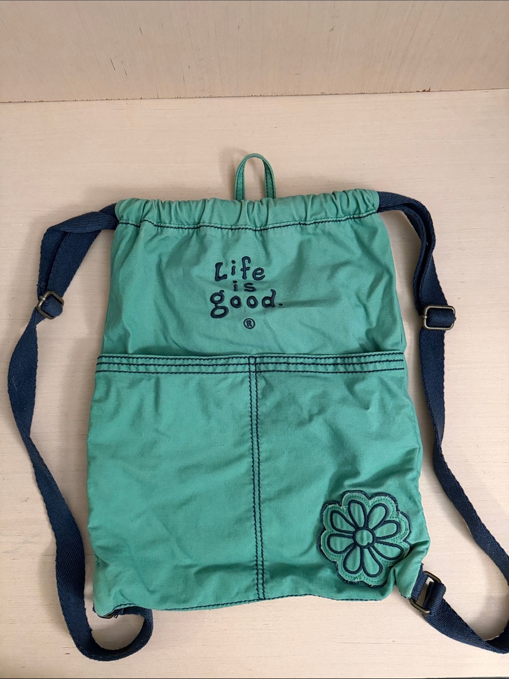 Life Is Good Teal Drawstring Floral Patch Backpack with Navy Straps